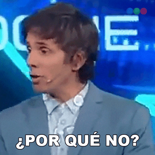 a man in a suit says " por que no "
