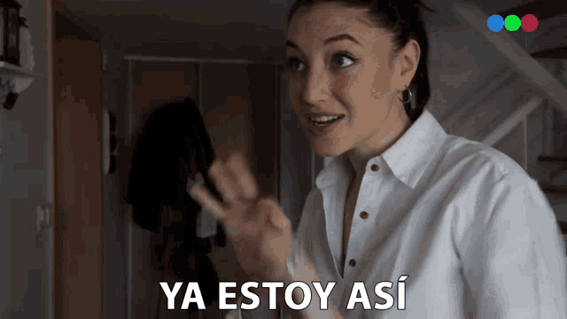 a woman in a white shirt says ya estoy a si