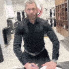 a blurry picture of a man in a black shirt