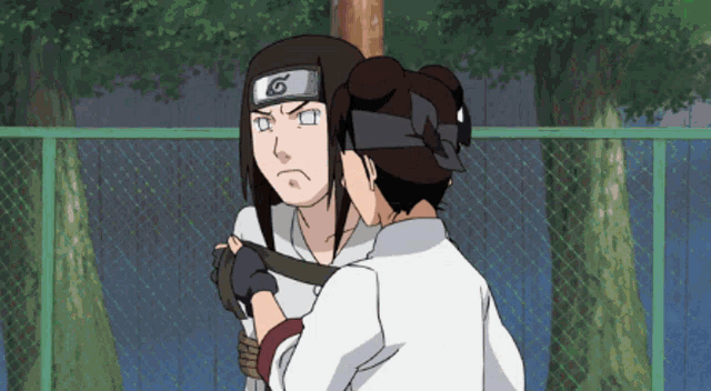 a couple of anime characters are hugging each other