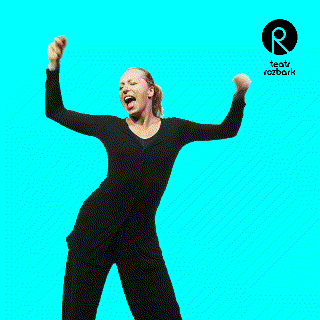 a woman in a black jumpsuit is dancing in front of a blue background with the word rozbark on it