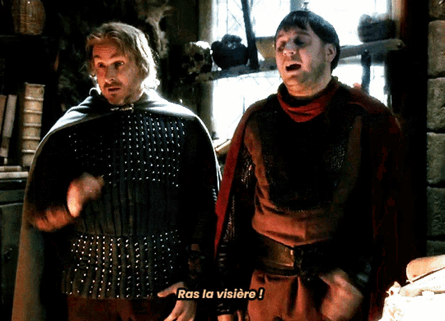 two men are standing next to each other and one of them is saying ras la visiere
