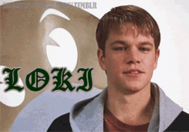 a young man with the name loki on his shirt