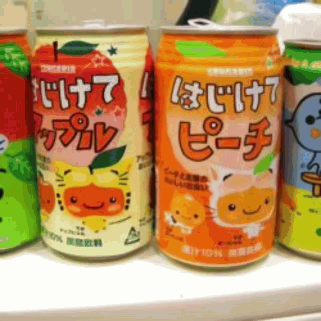 a row of cans with one that says apple on it