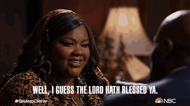 a woman in a leopard print shirt says well i guess the lord hath blessed ya.