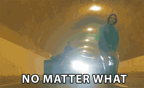 a man standing in a tunnel with a car behind him and the words " no matter what " above him