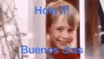 a close up of a child 's face with the words `` hola !!! buenos dias '' written above it .