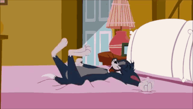 a cartoon cat is laying on its back on a bed with a lamp in the background