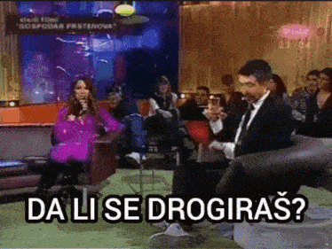 a group of people sitting in a room with the words da li se drogiras written on the bottom