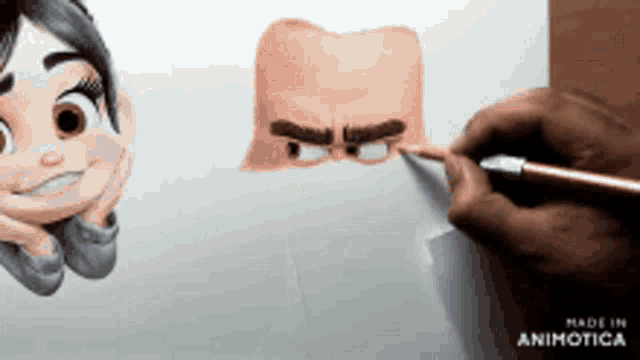 a person is drawing a cartoon character on a piece of paper that says made in animatica on the bottom