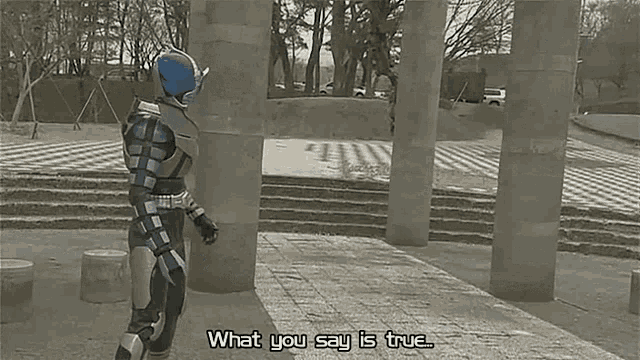 a man in a superhero costume is standing in front of a row of pillars and says what you say is true