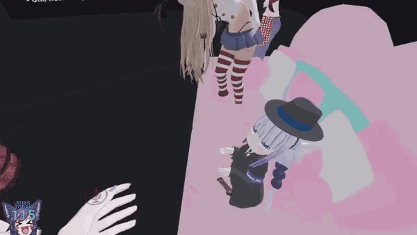 a group of anime characters are laying on a bed .