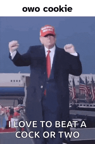 donald trump is wearing a red hat and a suit and tie while dancing .