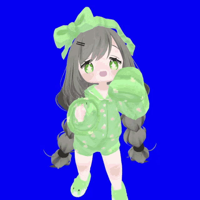 a little girl with long brown hair and green eyes is wearing green pajamas