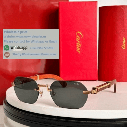 a pair of cartier sunglasses sitting on top of a white table