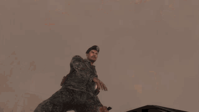 a man in a u.s. army uniform is holding a gun