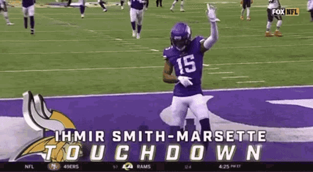 a football player with the number 15 on his jersey is on the field