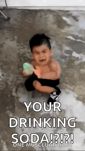 a little boy is crying while holding a soap dispenser in his hand .
