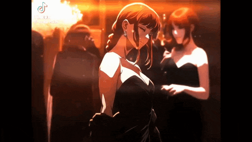 a woman in a black dress is standing in a dark room .