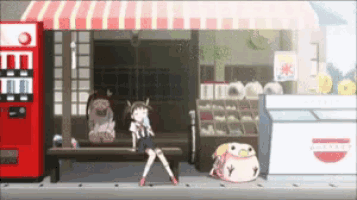 a girl standing in front of a vending machine