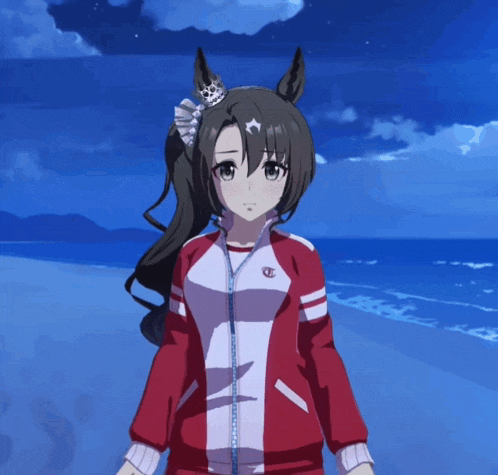 a girl with a crown on her head is wearing a red jacket with the letter c on it