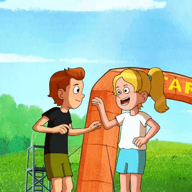 a boy and a girl are standing in front of an arch that says af