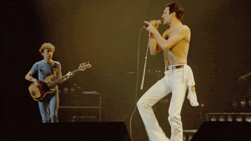 Freddie Mercury Queen GIF - Freddie Mercury Queen Dragon Attack GIFs