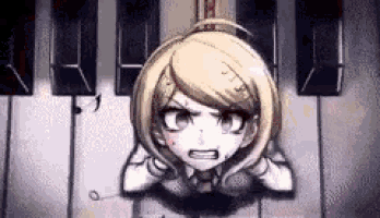 a girl is laying on top of a piano keyboard and looking angry .