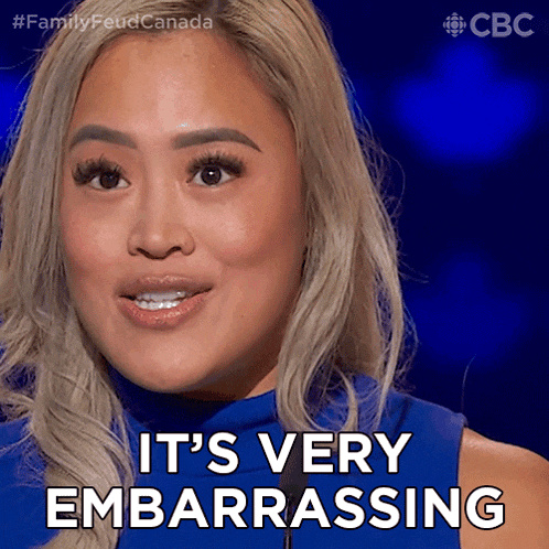 a woman says it 's very embarrassing while wearing a blue top