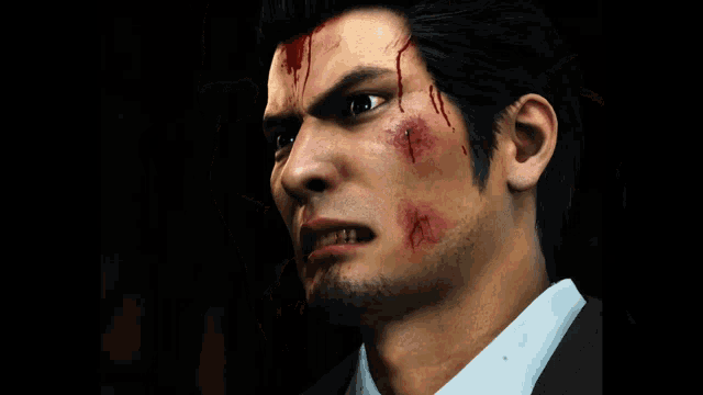 a close up of a man 's face with blood on his face