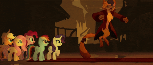 a group of ponies standing next to a cat in a red coat