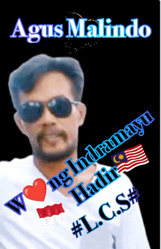 a man wearing sunglasses and a white shirt with the name agus malindo on it