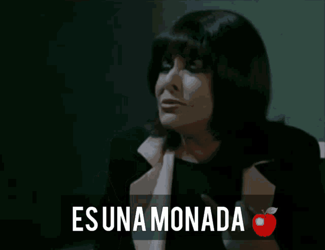 a woman smoking a cigarette next to a sign that says esuna monada