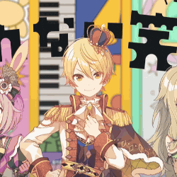 a boy with a crown on his head stands next to two girls