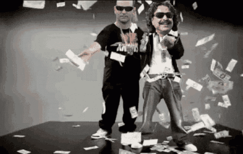a man with a mustache is standing in front of a pile of money