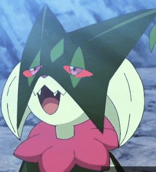 a close up of a cartoon character with a flower on its chest and a star on its head .