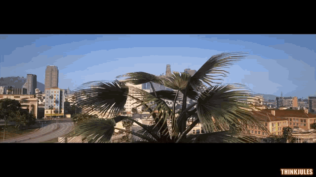 a video of a city with a palm tree in the foreground and think jules written on the bottom