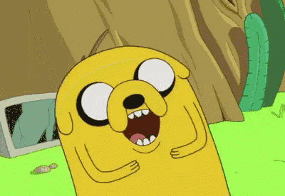 a cartoon character named jake from adventure time with his mouth wide open