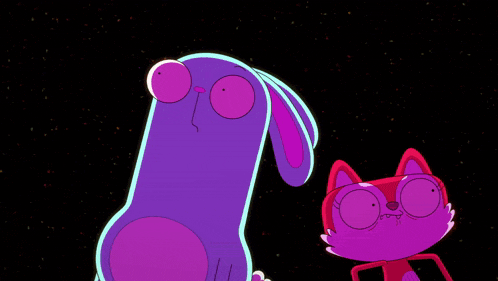 a purple bunny and a pink cat are standing next to each other