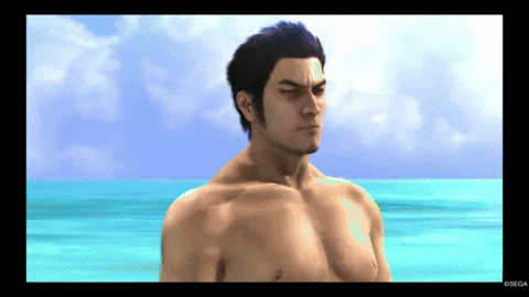 a man without a shirt is standing on the beach
