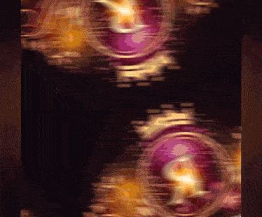 a dark background with purple and gold circles moving