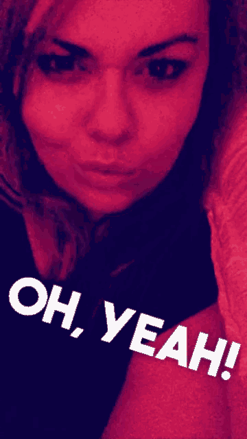 a woman taking a selfie with the words oh yeah