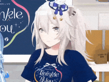 a girl wearing a t-shirt that says " twinkle 4you "