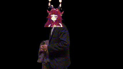 a man in a suit has a red haired anime character on his head .