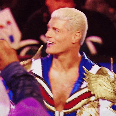 a man in a blue white and red outfit with a statue of an eagle on his shoulder