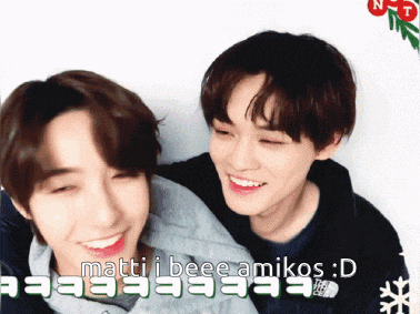 two young men are hugging and smiling with the words matti i beeee amikos : d written below them