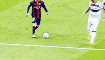 two soccer players are playing a game of soccer on a field . one of the players is wearing a number 20 jersey