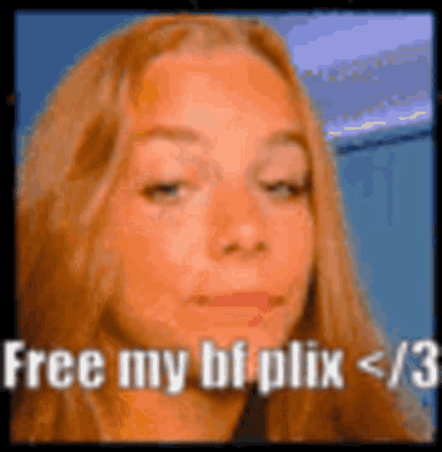 a close up of a woman 's face with the words `` free my bf flix < / 3 '' written on it .