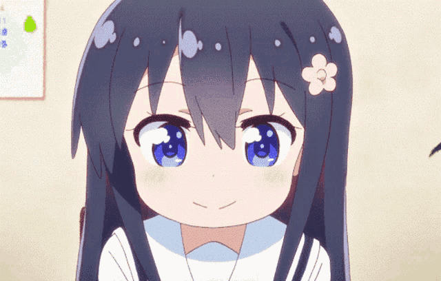 a girl with long black hair has a pink flower on her head