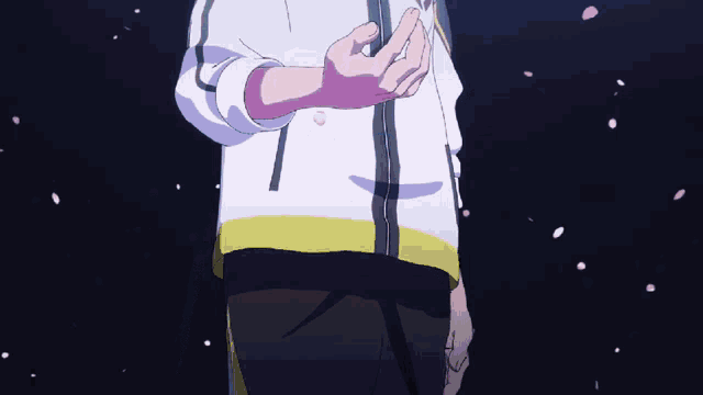 a person is holding something in their hand and petals are falling from the sky